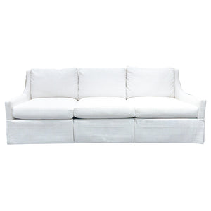 The Chatham Dressmaker Sofa in Homespun Sea Salt by Hickory Chair is a three-seat white sofa with three seat cushions and three back cushions, featuring straight arms and a skirted base that showcases tailored construction reminiscent of classic English club chair style.