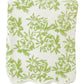 A neatly folded towel from the Weezie Towels x Meg Braff Bath Collection, featuring a green floral pattern and scallop trim, exudes Palm Beach elegance.