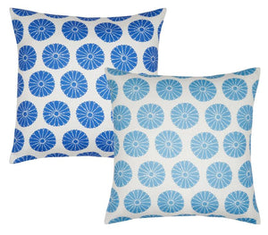 The Aleesa Outdoor Pillows by John Robshaw feature two square designs with white backgrounds and circular floral patterns—one in dark blue, one in light blue. Durable and stylish, they resist sun and rain for long-lasting outdoor use.