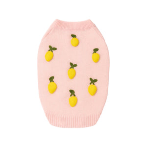 The Icon Sweater by Found My Animal is a light pink knit dog sweater featuring evenly spaced small yellow lemons and green leaves on the front.