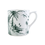 The Depareillees Vert Dinnerware and Serveware Collection by Gien France features a white ceramic mug with iconic black and white illustrations of palm trees, a domed mosque, minaret, and nearby figures—perfect for your unique collection or table.
