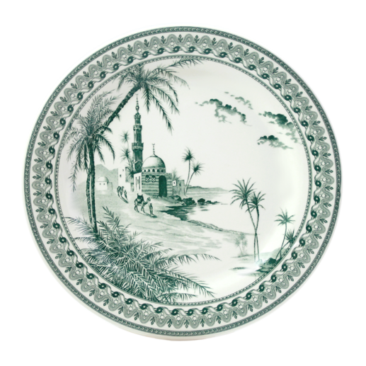 The Depareillees Vert Dinnerware and Serveware Collection by Gien France features a round ceramic plate with a decorative border, illustrated with palm trees, people, and a mosque motif—an elegant accent for any table.