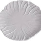 A white ceramic plate from the Vida Lettuce Dinnerware Collection by Beatriz Ball features a textured, leaf-inspired pattern radiating outward from the center.