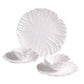 Three white ceramic dishes from the Vida Lettuce Dinnerware Collection by Beatriz Ball, featuring a floral, petal-like texture—includes two bowl-and-plate sets and one large dinner plate.
