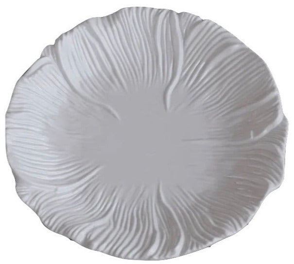 A round white plate from the Beatriz Ball Vida Lettuce Dinnerware Collection, crafted in luxury melamine with a petal-like textured pattern radiating from the center.