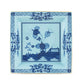 Square porcelain plate from the Ginori 1735 Oriente Italiano Iris with Gold Dinnerware & Decor Collection, featuring blue floral and geometric patterns on a light blue background—inspired by classic Faenza ceramics and perfect for enhancing your porcelain dinnerware collection.