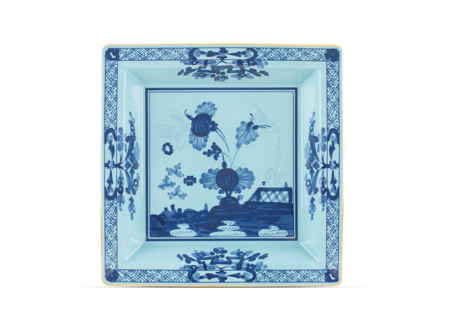 Square porcelain plate from the Ginori 1735 Oriente Italiano Iris with Gold Dinnerware & Decor Collection, featuring blue floral and geometric patterns on a light blue background—inspired by classic Faenza ceramics and perfect for enhancing your porcelain dinnerware collection.