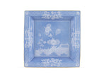 Inspired by Ginori 1735’s Oriente Italiano Pervinca Serveware & Decor Collection, this square blue porcelain tray features white floral motifs, a central flower design, and ornate borders—ideal for pairing with matching dinner plates.