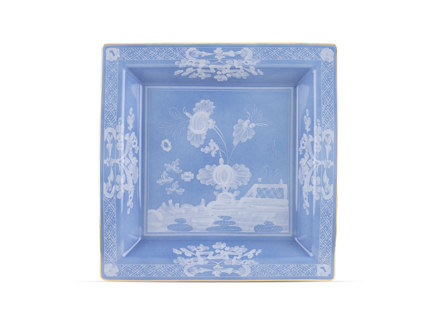Inspired by Ginori 1735’s Oriente Italiano Pervinca Serveware & Decor Collection, this square blue porcelain tray features white floral motifs, a central flower design, and ornate borders—ideal for pairing with matching dinner plates.