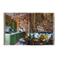 A kitchen and dining area inspired by My Life in Colors from Penguin Random House uses green cabinets, orange walls, and decorative plates to create a cozy space with a tapestry, patterned cushions, and bowls of lemons.