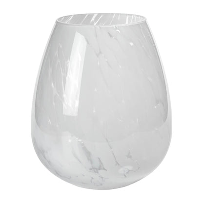 The Zodax Liguria Confetti Glass Vase features a round base and subtle white marbled patterns, making it an elegant décor piece for any space.