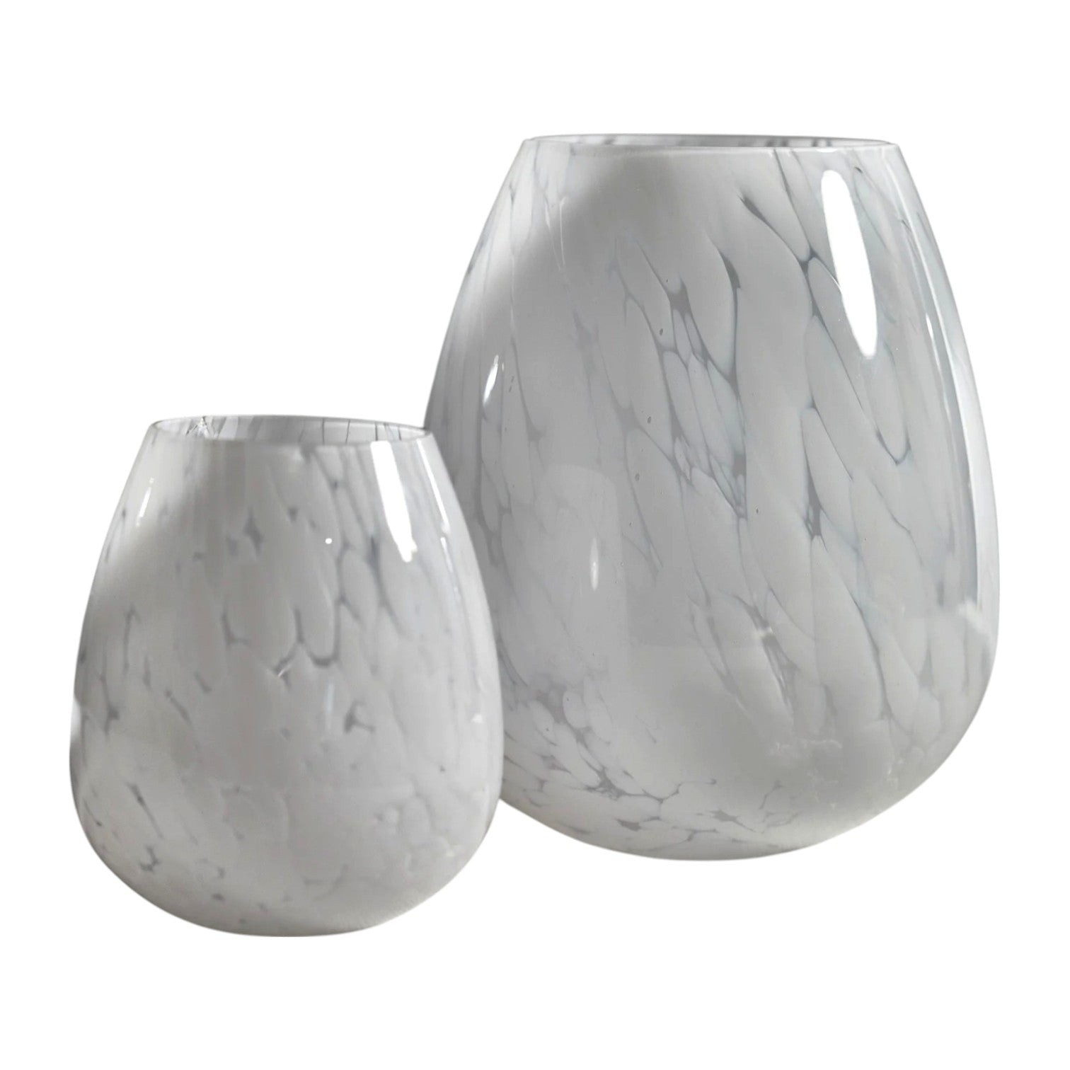 Two Liguria Confetti Glass Vases by Zodax—one large, one small—feature a white speckled, marbled design and are displayed side by side on a white background, ideal for adding elegant décor to any space.