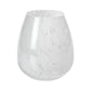 The Zodax Liguria Confetti Glass Vase features a clear, rounded design with a subtle white marbled pattern, making it perfect for elegant décor.
