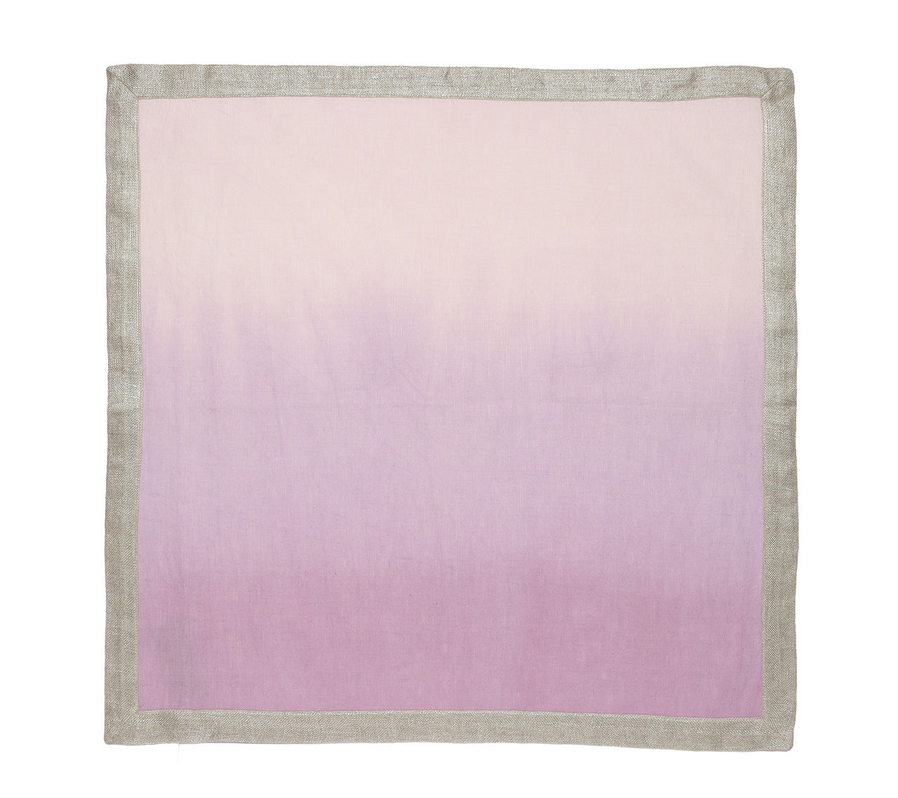 The Kim Seybert Dip Dye Napkin Set features square fabric that transitions from light pink to lavender, accented by a thin gray edge, evoking autumn hues.