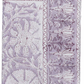 A folded fabric napkin from the Kim Seybert Provence Napkin Set features a detailed lavender and white floral and geometric block print, ideal for mixing with a matching tablecloth or other Provence Napkins for a cohesive, playful table setting.