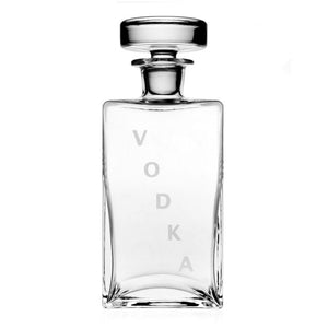 The William Yeoward Crystal Lillian Square Decanter Collection features a clear crystal glass decanter labeled "VODKA" vertically in gray letters—elegantly handmade and photographed on white, it’s a perfect gift for any spirits enthusiast.
