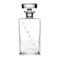 The William Yeoward Crystal Lillian Square Decanter Collection features a clear handmade crystal decanter with a round stopper and "TEQUILA" in vertical lettering, making an elegant gift. Shown empty against a white background.