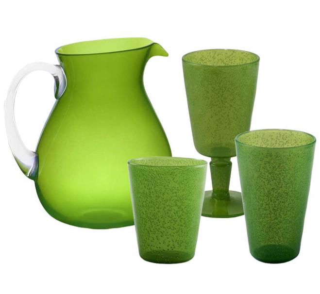 The Memento Lime Acrylic Drinkware Collection features a green pitcher with clear handle, two tumblers, and a goblet—translucent pieces ideal for bringing bold color to outdoor dining.