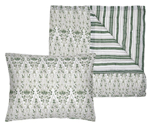 The Lina Sage Bedding Collection by John Robshaw features a green and white botanical pillow and quilt set, hand quilted from soft cotton voile with leafy designs on one side and green and white stripes on the reverse. Final Sale.