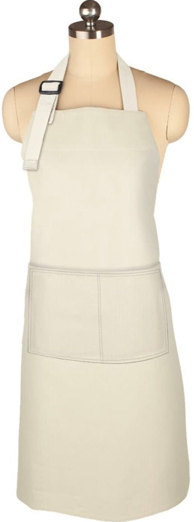 A durable, beige MUkitchen Classic Apron in linen with two front pockets and an adjustable fit is displayed on a dress form mannequin.