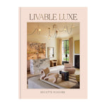 The cover of "Livable Luxe" by Chronicle Books features refined interior design, displaying a modern, elegant living room with neutral tones and contemporary furniture.