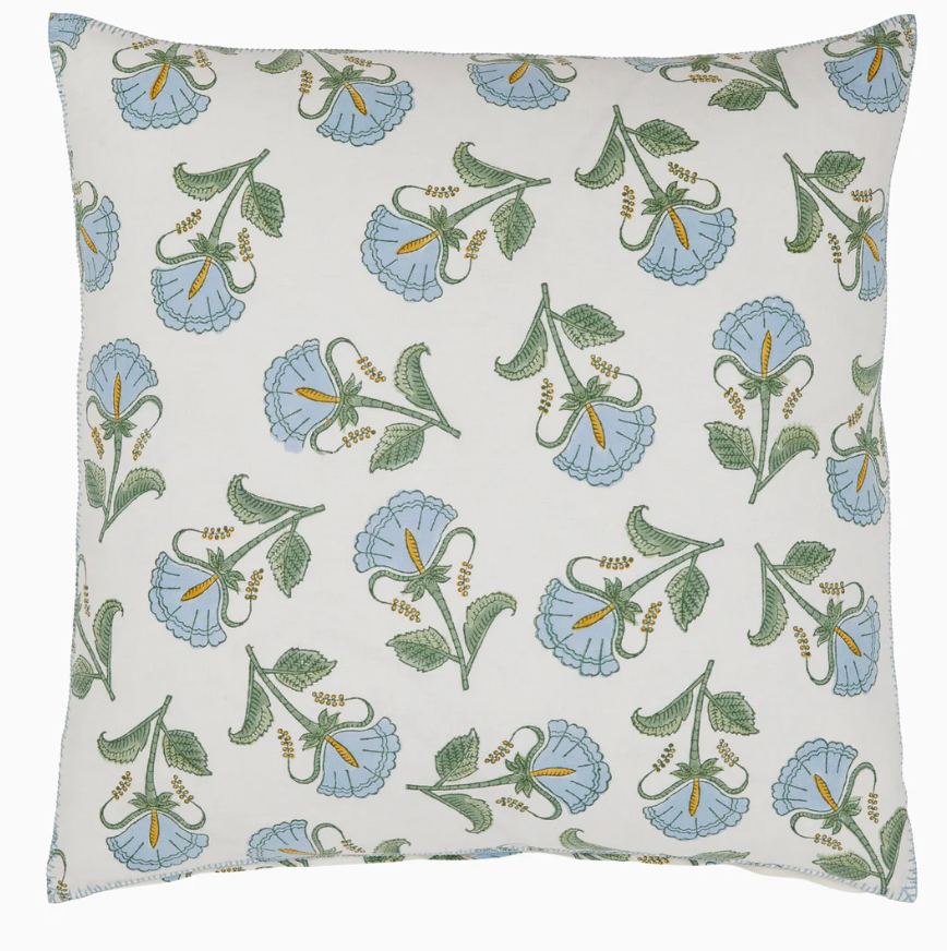 The Farah Light Indigo Pillow by John Robshaw features a dreamy hand block-printed indigo floral and green leaf pattern with yellow accents on a white background, adding a charming touch to any space.
