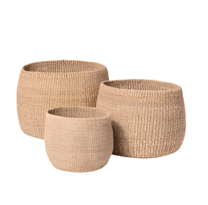 The Made Goods Palben Abaca Basket in small features a pliable, natural weave perfect for everyday use, shown here against a white background.