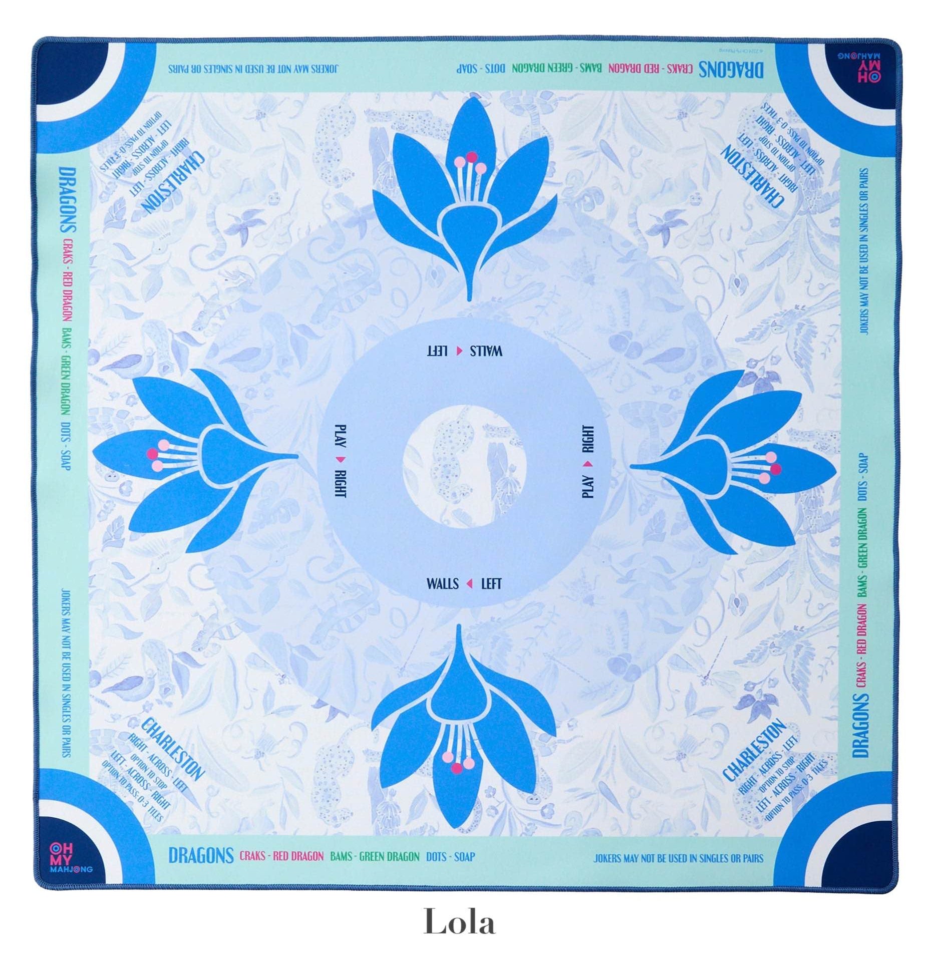 The Oh My Mahjong Mat Collection by Oh My Mahjong offers a durable, non-slip neoprene mat with a blue and white floral design. It has spaces for "Dragons," "Walls," and "Pong," plus game instructions printed around the border.