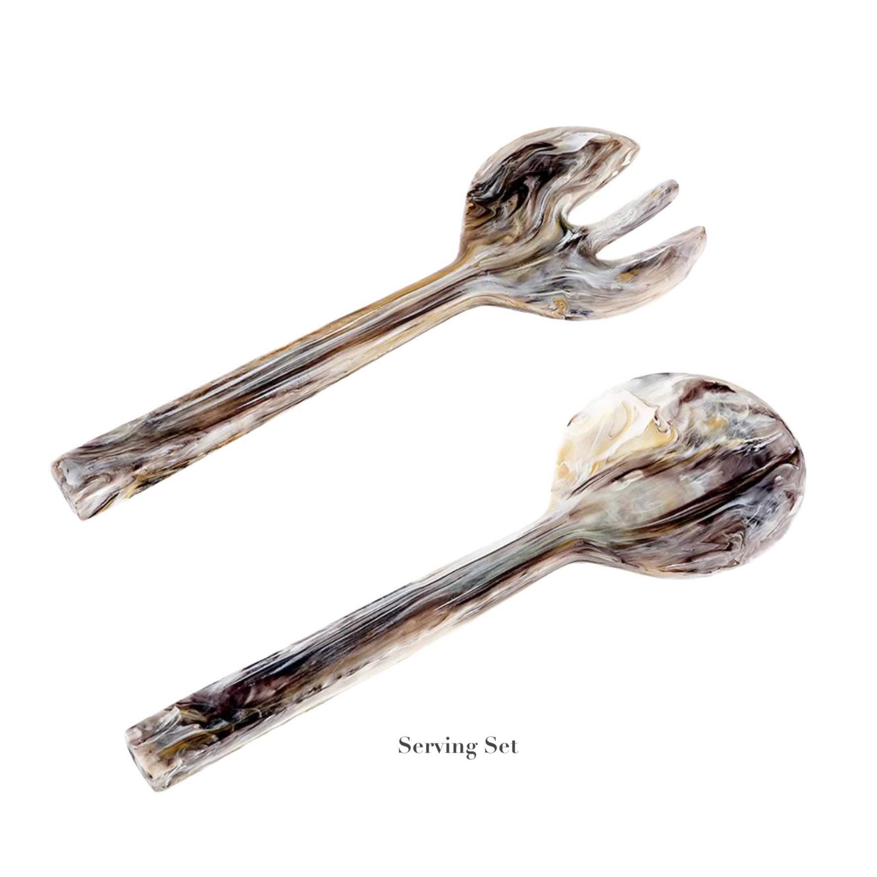Two marbled utensils—a fork and spoon—from the Mocha Resin Serveware Collection by Nashi Home are displayed on a white background labeled "Serving Set," perfect for adding food-safe style to your home decor.