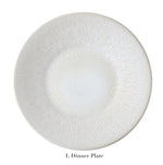 A round, light-toned ceramic plate with a subtle textured pattern and elegant perle glaze from Jars' Vuelta White Pearl Collection, labeled "L Dinner Plate" below.