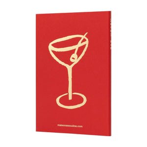 Swans Bar by Assouline is a red book featuring a gold cocktail glass and olive illustration on the cover—perfect for cocktail lovers—with "maisonsassouline.com" at the bottom.