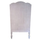 The Luberon Chair by Mr Brown, featuring a curved wooden back and two carved legs, elegantly showcases French country style charm against a white background.