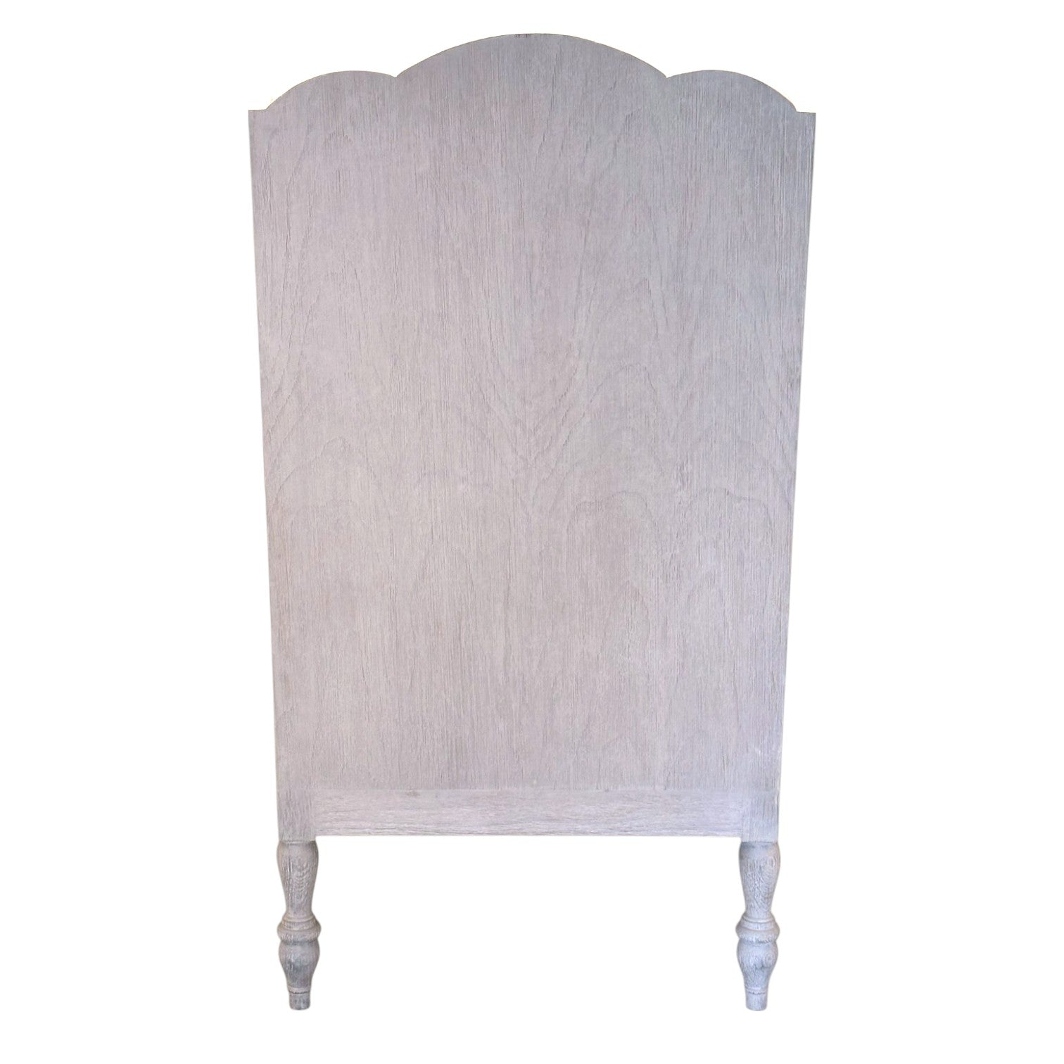 The Luberon Chair by Mr Brown, featuring a curved wooden back and two carved legs, elegantly showcases French country style charm against a white background.