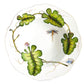 From the Garden Leaves Dinnerware Collection by Anna Weatherley, this white porcelain plate features a scalloped edge and is hand painted with green leaves, a dragonfly, a snail, and a butterfly, all elegantly connected by a vine motif.