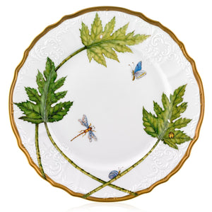 From the Elegant Foliage Dinner Plate Collection by Anna Weatherley, this decorative porcelain plate features hand-painted green leaves, a butterfly, dragonfly, snail, ant, and a gold rim on a white background.