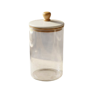 The Be Home Madras Canister is a clear glass jar with a wooden lid and knob, ideal for kitchen storage or pantry organization, shown against a plain white background.