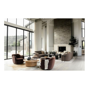 Modern living room with floor-to-ceiling windows and curated decor—explore inspiration in Meridith Baer: The Making of a Home by Abrams.