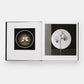 The open pages of "Mapplethorpe Flora: The Complete Flowers" by Phaidon reveal two black and white images: one featuring a circular object, the other an orchid amidst a geometric setting, embodying the unique style of twentieth-century artists such as Robert Mapplethorpe.