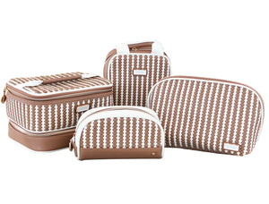 Four brown and white patterned bags from the Stephanie Johnson Marbella Mocha Travel Collection—including a stylish makeup bag and a compact mini pouch—are arranged together on a white background.