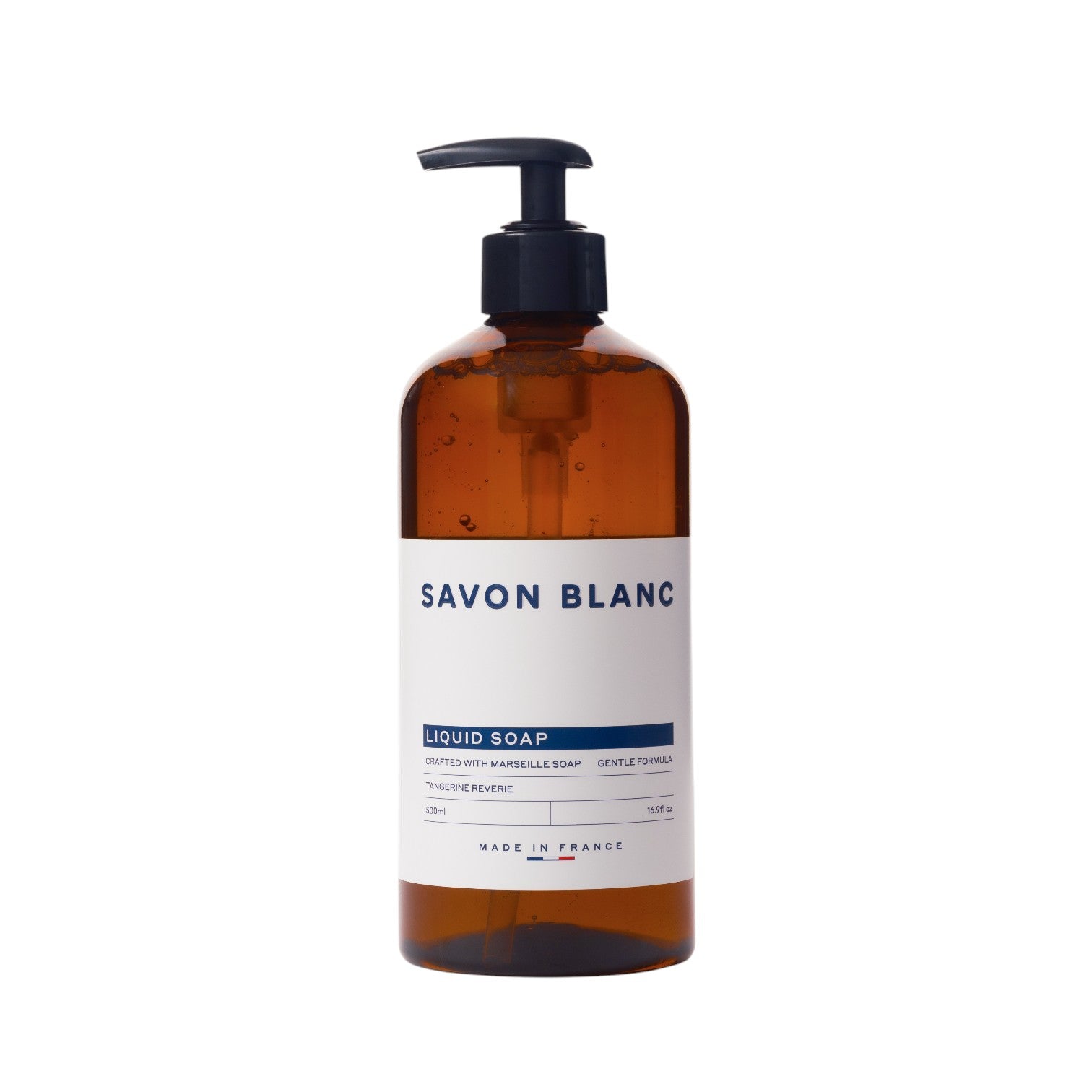 A 500ml brown plastic pump bottle from the Savon Blanc Soap Collection, featuring a chic white and blue label with "Made in France"—ideal for anyone who values natural beauty in daily routines.