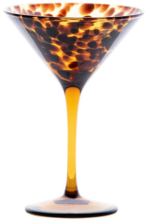 A Juliska tumbler with an amber-colored, Juliska Puro Tortoiseshell Collection patterned design.