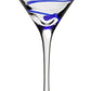 The Bella Blue Collection martini glass by William Yeoward Crystal features a clear bowl accented with a blue swirl, displayed on a plain white background.