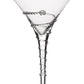 A martini glass from the Juliska Amalia Drinkware Collection features a handcrafted spiral pattern and glass bead accent on the stem, created by master artisans.