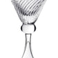The Venetia Drinkware Collection by William Yeoward Crystal features clear crystal martini glasses with wide, conical bowls, a spiral pattern, elegant Venice-inspired stems, and broad flat bases.
