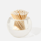 A clear glass container holds white-tipped wooden matches, arranged upright—an elegant accessory from Tart by Taylor’s Acrylic Match Striker Collection, perfect for pairing with your favorite acrylic match striker or decorative strike pad.