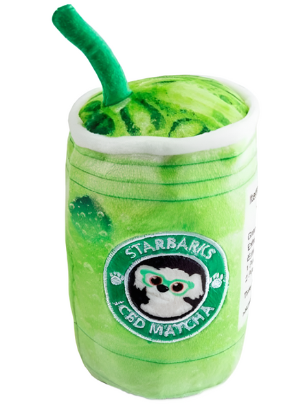 Sentence with replacement: Haute Diggity Dog Starbarks Iced Matcha Plush Toy designed to resemble a green matcha drink from a parody "starbarks" coffee shop, complete with a straw.