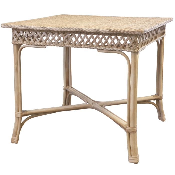The Trellis Game Table by Mainly Baskets Home features a square wicker top with a lattice design and four curved legs, evoking the look of elegant European garden trellises.