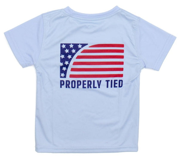 Blue Properly Tied Performance SS Tee with classic American flag-inspired design on back and the text "properly tied" on it, perfect as a boys' tee.
