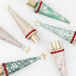 Six Meri Meri Liberty Tree Crackers featuring floral and star patterns, finished with red trim and gold star toppers.