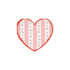 Heart-shaped paper napkin with pink and white pattern on a light gray background
